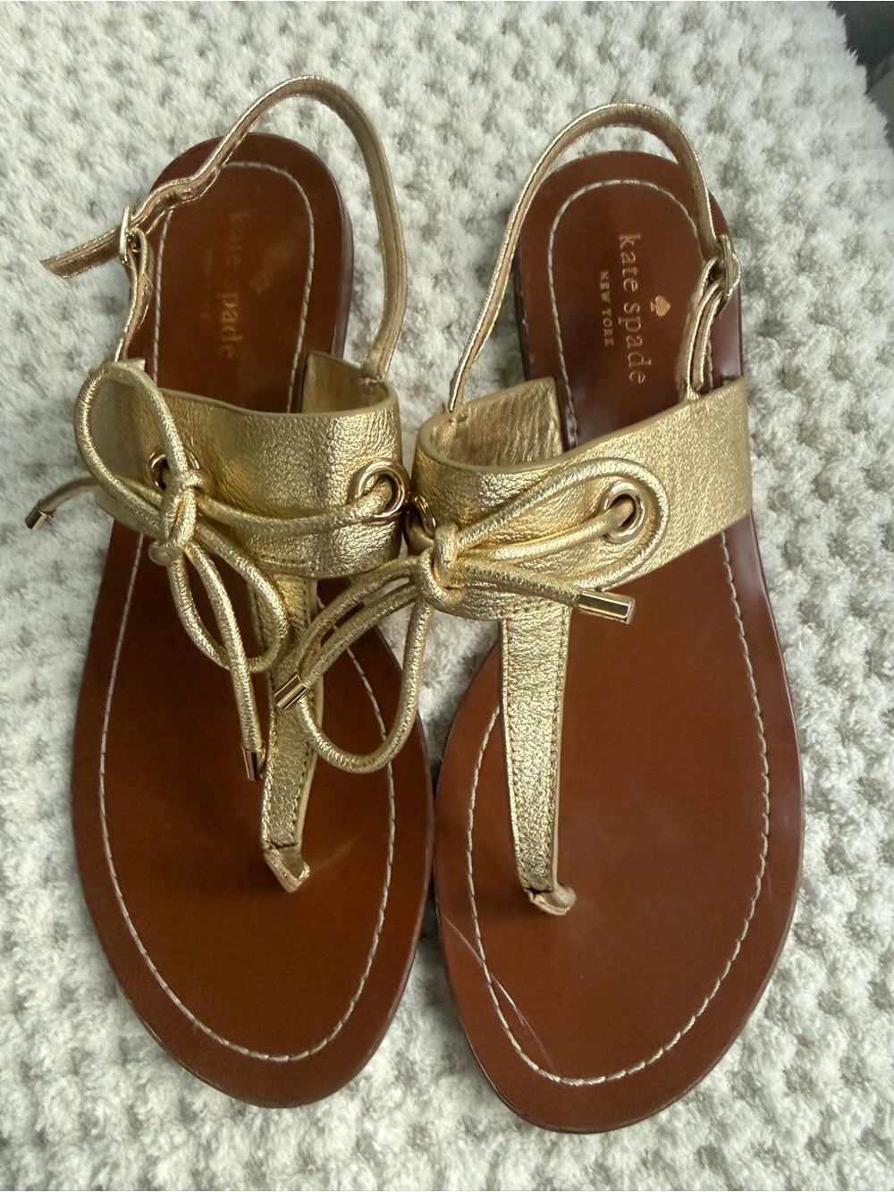 kate spade Metallic Gold Leather Bow Thong Sandals with Brown Footbed